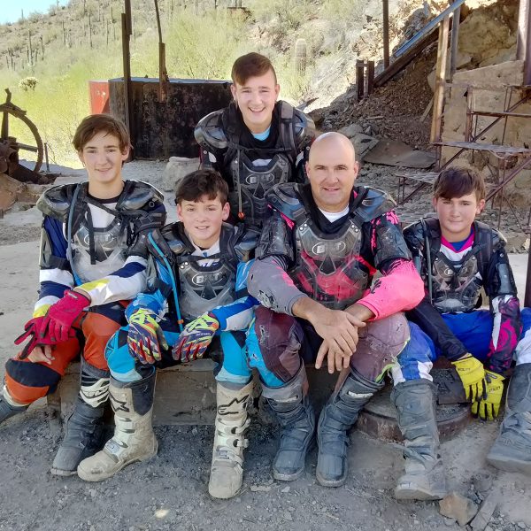 Family riding dirt bikes in Arizona